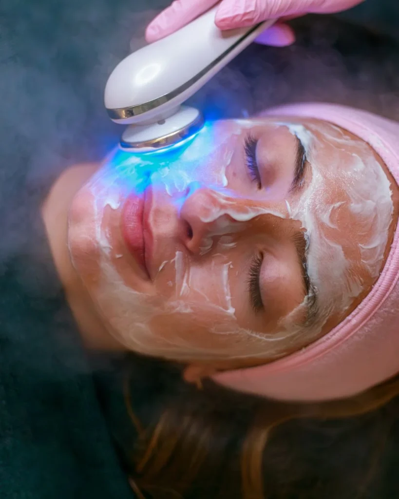 A client receiving a HydraFacial treatment at Vivo Body & Skin Clinic in Mumbai, using a hydrating facial device to cleanse, exfoliate, and hydrate the skin.